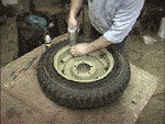 Tony reassembles jeep combat wheel